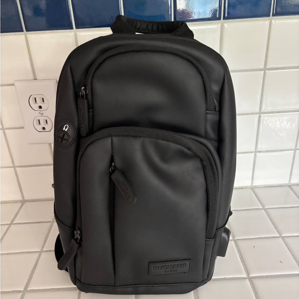 Duchamp Rubberized Black Sling Bag Backpack